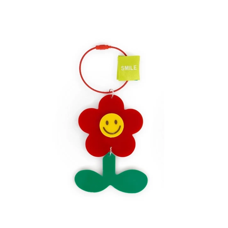porte clés daisy rouge helio ferretti maison volumes lille 2